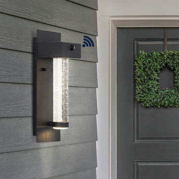 Horizone 5.5" Minimalist Industrial Iron/Glass Seeded Glass with Dusk-to-Dawn Sensor Integrated LED Outdoor Sconce - JONATHAN Y